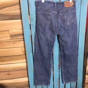 Levi’s 501 button fly Jeans size 35x28 (tag size 36x34) lightly distressed